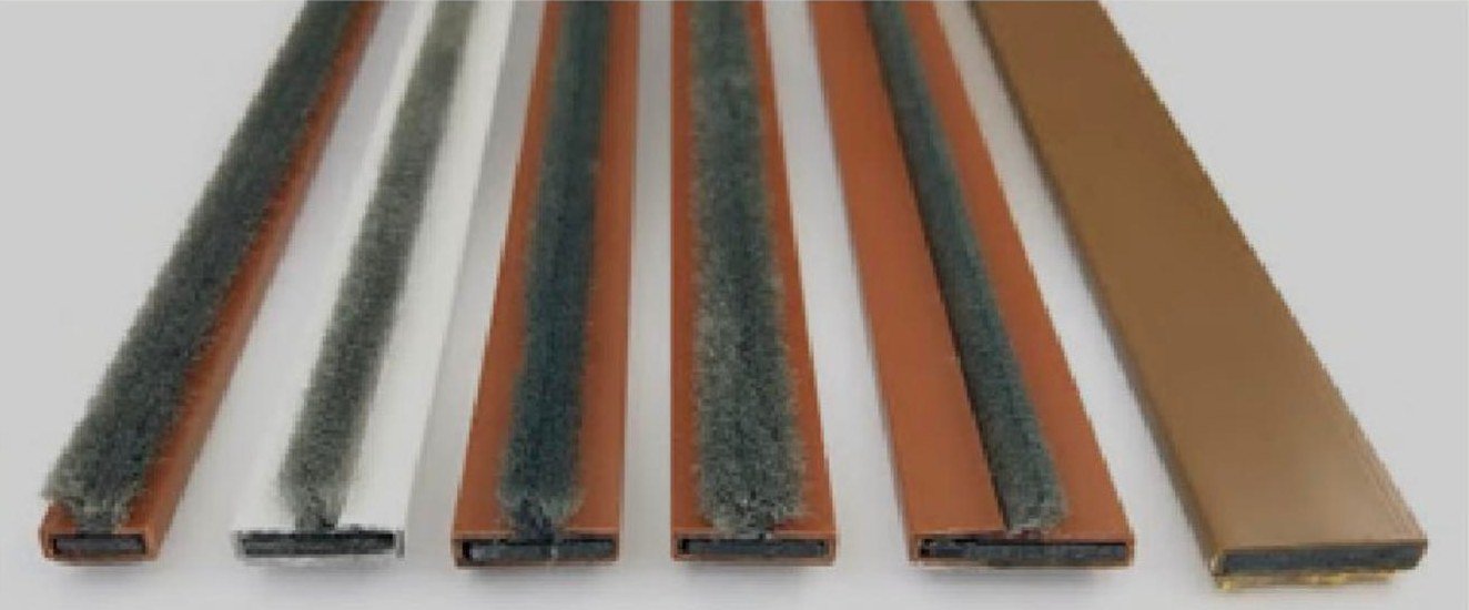 INTUR rigid intumescent fire seal strips with PVC cover, brush and neoprene smoke seal versions for fire doors