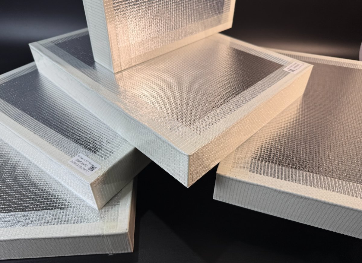 Vacuum insulation panels (VIP) with fibreglass-faced covering used as the wall core of Wedge VIP insulated cold boxes
